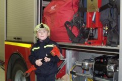 Naši nejmenší při focení novoročenky ....